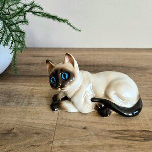 Vintage ceramic Siamese kitten/cat figurine with blue glass eyes. Korea.